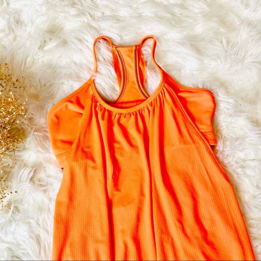 Original Lululemon No Limits solid orange tank to